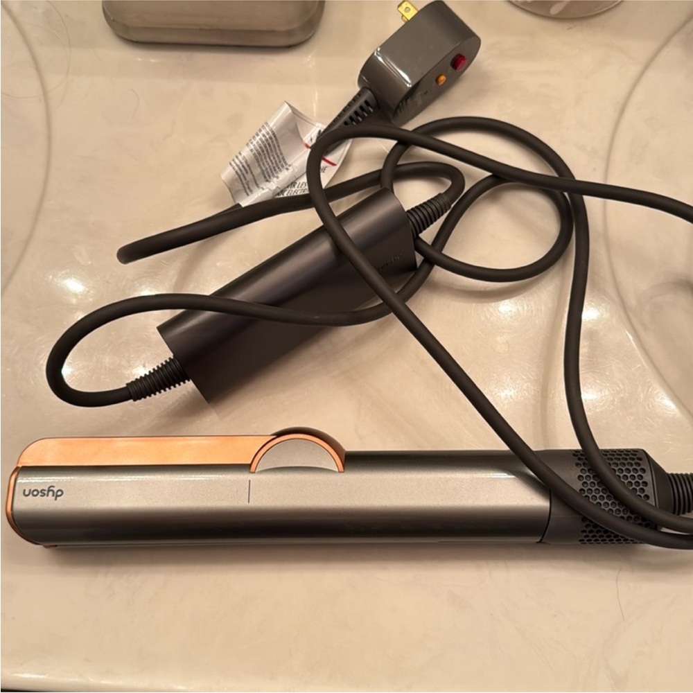 Dyson Airstrait dryer and straightener